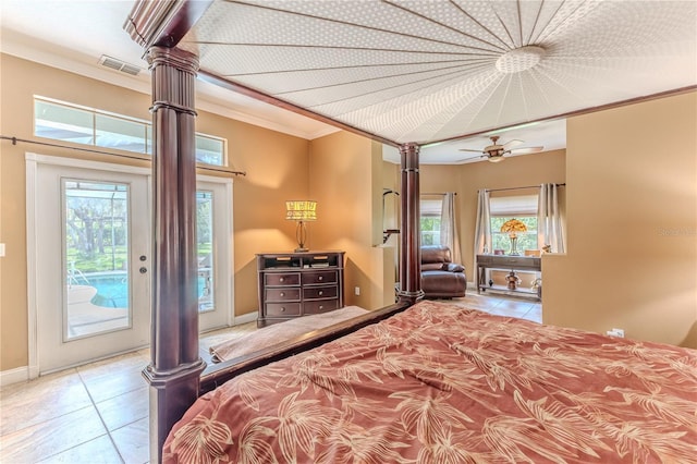 11510 Lakeview Dr, New Port Richey, FL 34654 - tiled bedroom featuring ornate columns, access to exterior, and ornamental molding