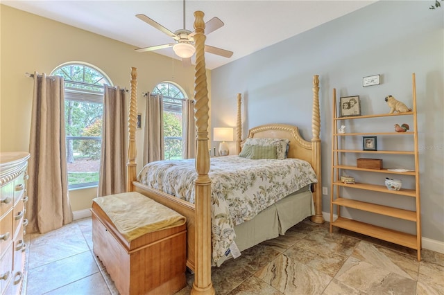 11510 Lakeview Dr, New Port Richey, FL 34654 - bedroom featuring baseboards and a ceiling fan