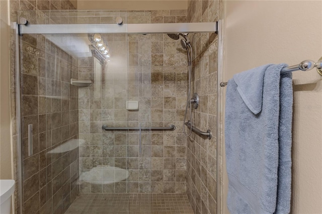 11510 Lakeview Dr, New Port Richey, FL 34654 - bathroom with a shower stall and toilet