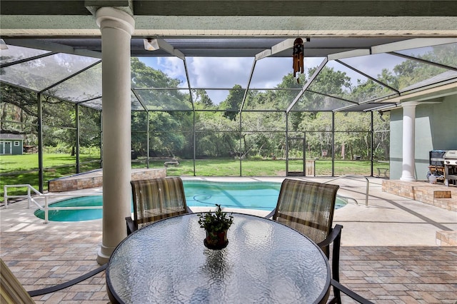 11510 Lakeview Dr, New Port Richey, FL 34654 - swimming pool with a patio area, glass enclosure, outdoor dining area, and a lawn