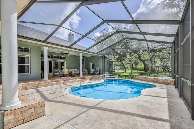 11510 Lakeview Dr, New Port Richey, FL 34654 - swimming pool with an outdoor hangout area, a patio area, ceiling fan, and glass enclosure