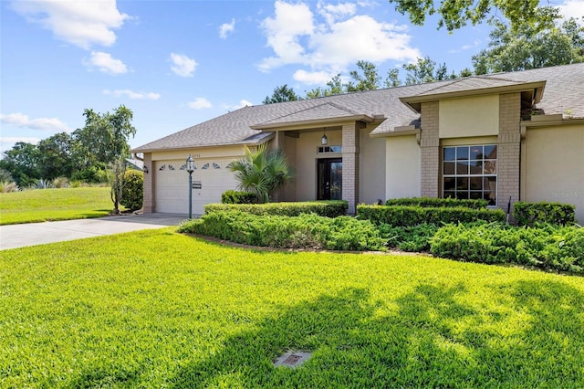 18736 Bent Pine Dr, Hudson, FL 34667 - view of front of house featuring brick siding, a front lawn, driveway, an attached garage, and roof with shingles