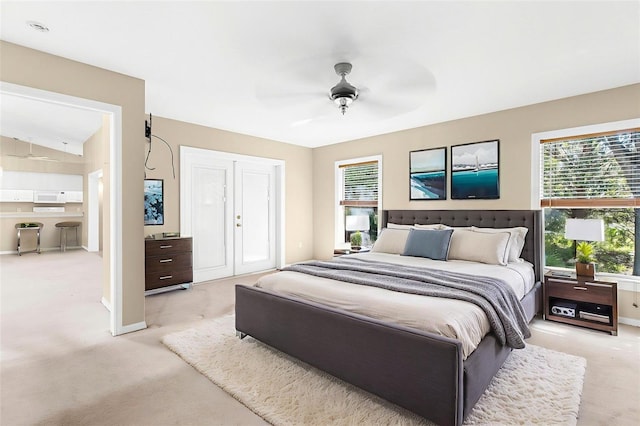 18736 Bent Pine Dr, Hudson, FL 34667 - bedroom featuring light colored carpet, multiple windows, and ceiling fan