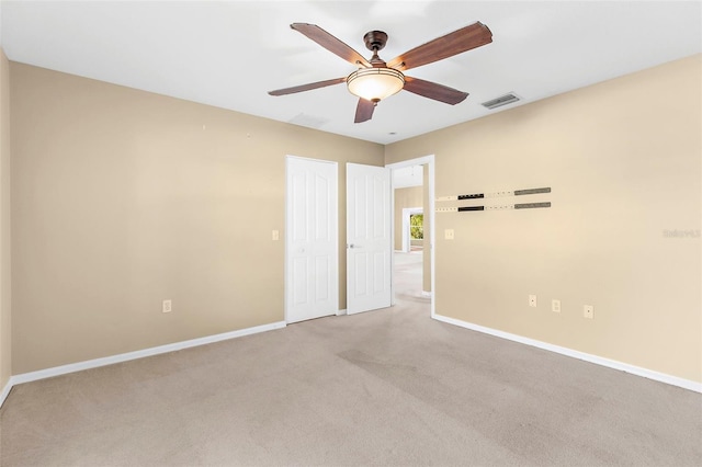 18736 Bent Pine Dr, Hudson, FL 34667 - unfurnished room featuring carpet flooring and ceiling fan