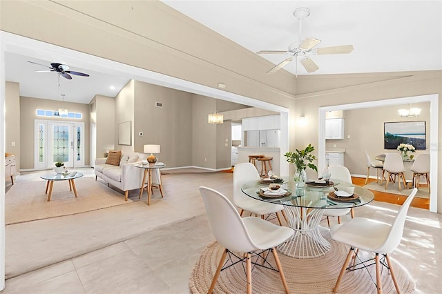 18736 Bent Pine Dr, Hudson, FL 34667 - dining area with ceiling fan, light colored carpet, and light tile patterned floors