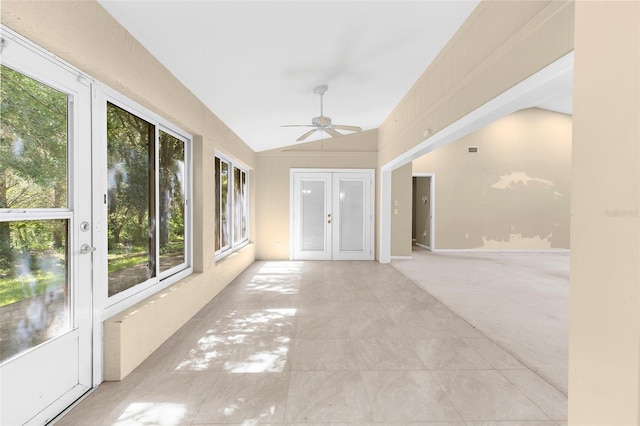 18736 Bent Pine Dr, Hudson, FL 34667 - unfurnished sunroom with french doors, healthy amount of natural light, vaulted ceiling, and carpet floors