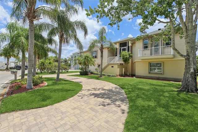 4052 Marine Pkwy, New Port Richey, FL 34652 - surrounding community featuring a yard and stairs