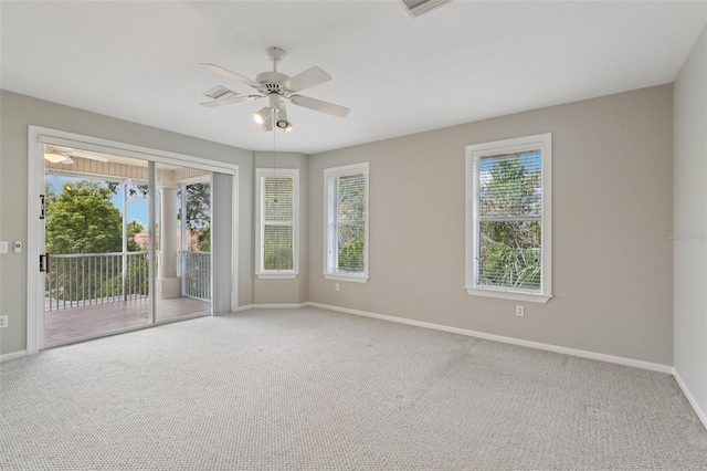 4052 Marine Pkwy, New Port Richey, FL 34652 - spare room featuring ceiling fan and carpet