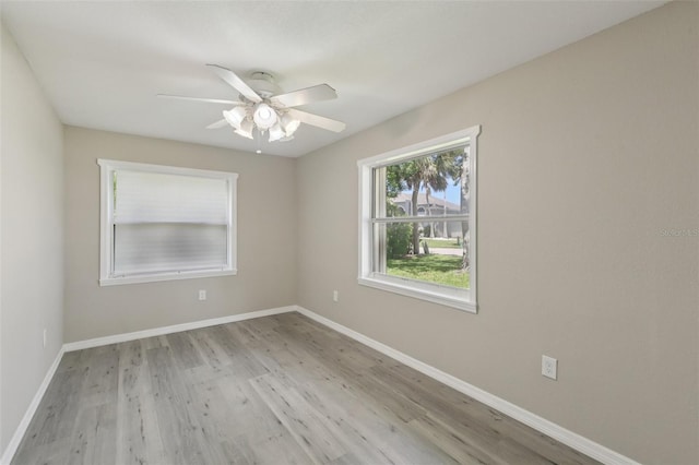 4052 Marine Pkwy, New Port Richey, FL 34652 - spare room featuring a ceiling fan and wood finished floors