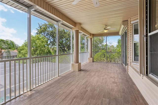 4052 Marine Pkwy, New Port Richey, FL 34652 - unfurnished sunroom featuring ceiling fan