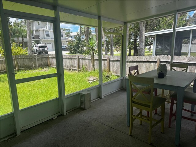 6826 Driftwood Dr, Hudson, FL 34667 - sunroom featuring outdoor dining area