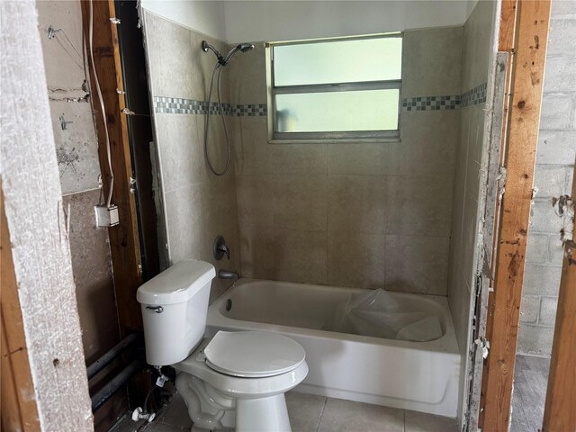 6826 Driftwood Dr, Hudson, FL 34667 - bathroom with bathing tub / shower combination and tile patterned floors