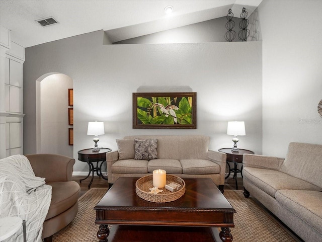 12060 Sapphire Dr, Spring Hill, FL 34609 - living area featuring lofted ceiling and arched walkways