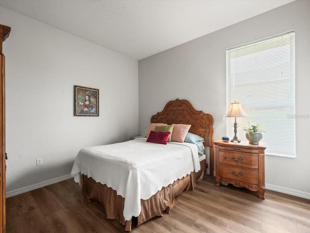 12060 Sapphire Dr, Spring Hill, FL 34609 - bedroom with wood finished floors