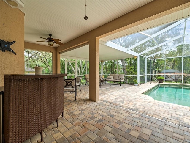 12060 Sapphire Dr, Spring Hill, FL 34609 - swimming pool featuring outdoor lounge area, a patio, ceiling fan, and a lanai