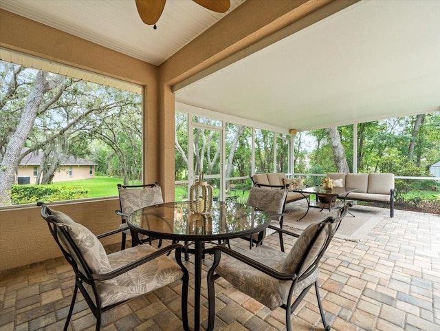 12060 Sapphire Dr, Spring Hill, FL 34609 - view of patio / terrace featuring a ceiling fan, an outdoor hangout area, and outdoor dining area