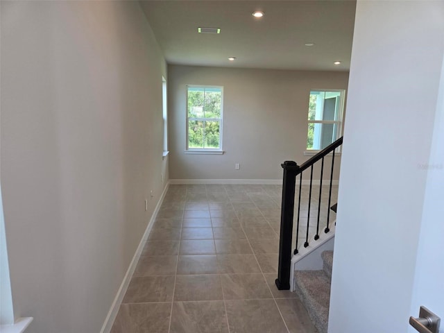 14425 Maiden Ter, Lakewood Ranch, FL 34211 - stairway featuring healthy amount of natural light, tile patterned flooring, and recessed lighting