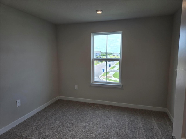 14425 Maiden Ter, Lakewood Ranch, FL 34211 - spare room featuring dark carpet