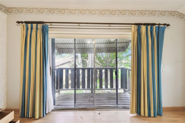 2101 Sunset Point Rd Unit 201, Clearwater, FL 33765 - detailed view of wood finished floors and baseboards