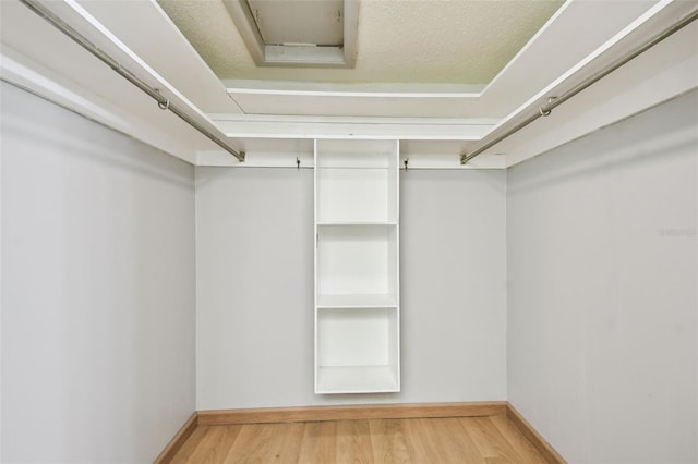 2101 Sunset Point Rd Unit 201, Clearwater, FL 33765 - spacious closet featuring wood finished floors
