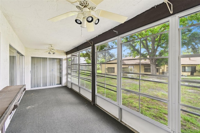 2101 Sunset Point Rd Unit 201, Clearwater, FL 33765 - unfurnished sunroom featuring ceiling fan