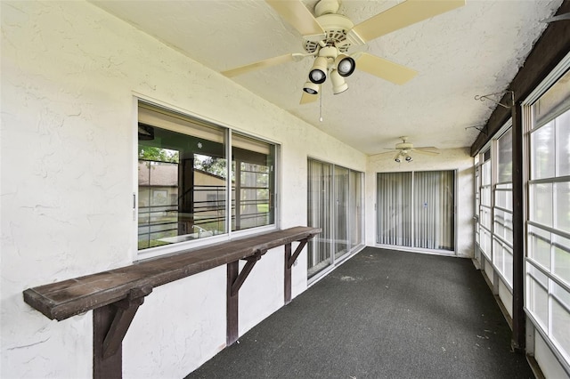 2101 Sunset Point Rd Unit 201, Clearwater, FL 33765 - unfurnished sunroom with a ceiling fan