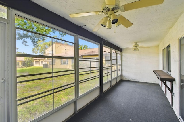 2101 Sunset Point Rd Unit 201, Clearwater, FL 33765 - unfurnished sunroom featuring ceiling fan