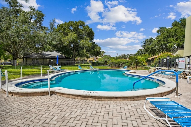 2101 Sunset Point Rd Unit 201, Clearwater, FL 33765 - community pool with a patio