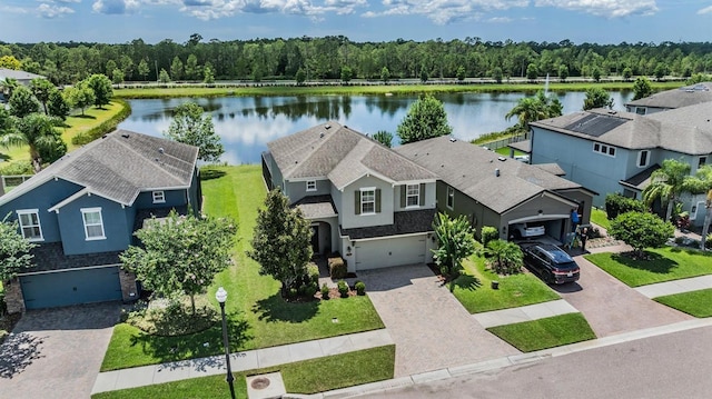 1783 Oak Hammock Ct, Lutz, FL 33558 - aerial view of residential area featuring a nearby body of water and a forest