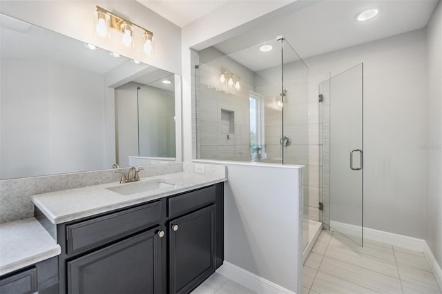 1783 Oak Hammock Ct, Lutz, FL 33558 - full bathroom with vanity, a stall shower, tile patterned flooring, and recessed lighting