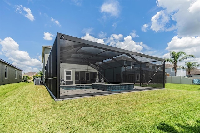 1783 Oak Hammock Ct, Lutz, FL 33558 - back of house featuring a patio area, glass enclosure, and a pool with connected hot tub