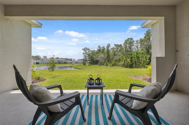 33466 Landsman Loop, Wesley Chapel, FL 33543 - view of patio / terrace featuring a water view