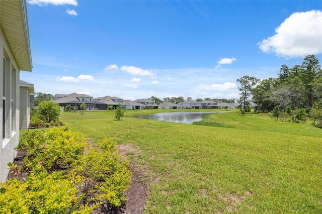 33466 Landsman Loop, Wesley Chapel, FL 33543 - view of green lawn with a water view and a residential view