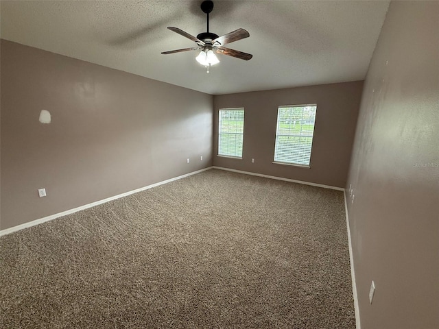 11308 Mahopac Rd, Weeki Wachee, FL 34614 - carpeted empty room with ceiling fan and a textured ceiling