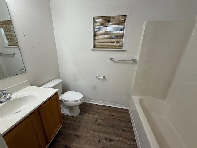 11308 Mahopac Rd, Weeki Wachee, FL 34614 - full bathroom with wood finished floors and vanity