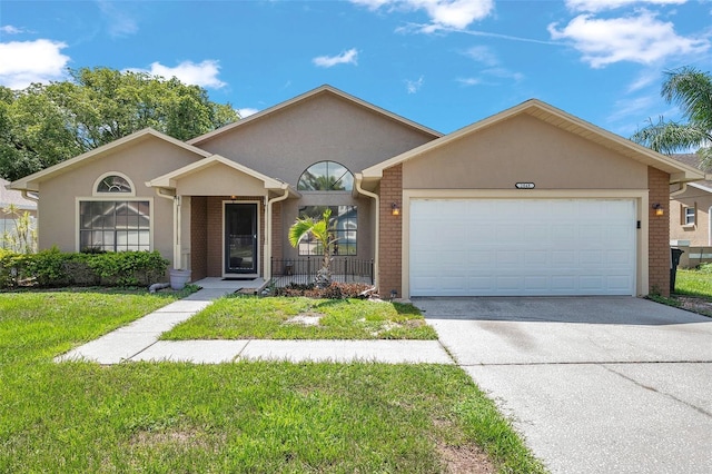 2048 Ground Squirrel Dr, New Port Richey, FL 34655 - ranch-style house with stucco siding, a garage, and concrete driveway