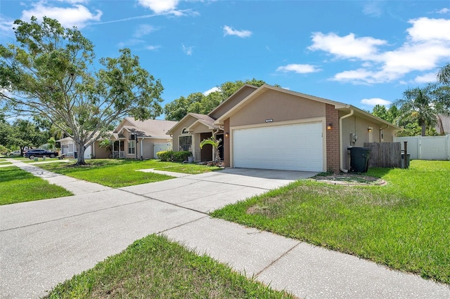 2048 Ground Squirrel Dr, New Port Richey, FL 34655 - ranch-style home with an attached garage, concrete driveway, stucco siding, and brick siding