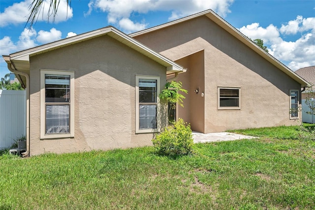 2048 Ground Squirrel Dr, New Port Richey, FL 34655 - view of side of property featuring stucco siding