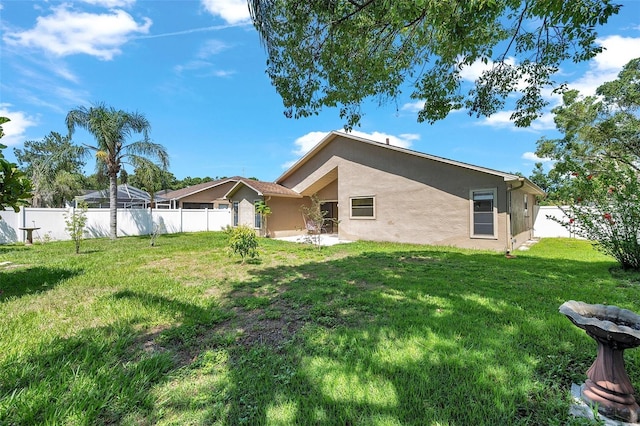 2048 Ground Squirrel Dr, New Port Richey, FL 34655 - rear view of house featuring stucco siding
