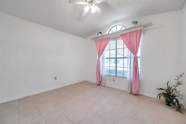 2048 Ground Squirrel Dr, New Port Richey, FL 34655 - spare room featuring a textured ceiling, ceiling fan, vaulted ceiling, and light tile patterned floors