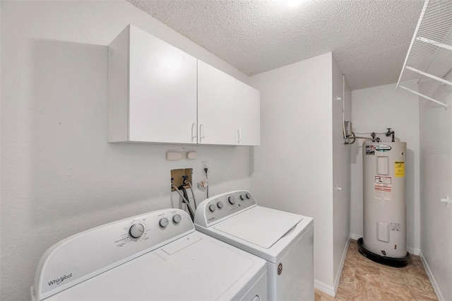 2048 Ground Squirrel Dr, New Port Richey, FL 34655 - laundry room featuring electric water heater, cabinet space, washer and dryer, and a textured ceiling
