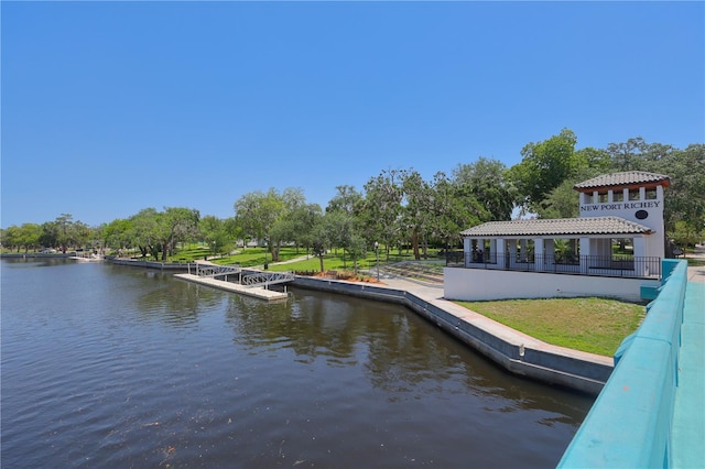 2048 Ground Squirrel Dr, New Port Richey, FL 34655 - dock area with a water view and view of wooded area