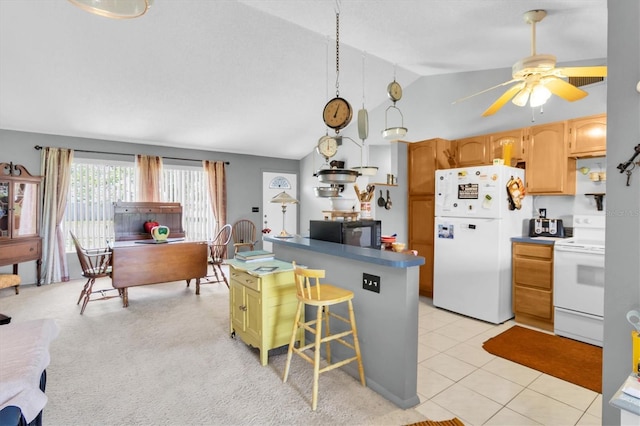 7701 Anaheim Ave, New Port Richey, FL 34655 - kitchen with white appliances, vaulted ceiling, ceiling fan, a desk, and a center island