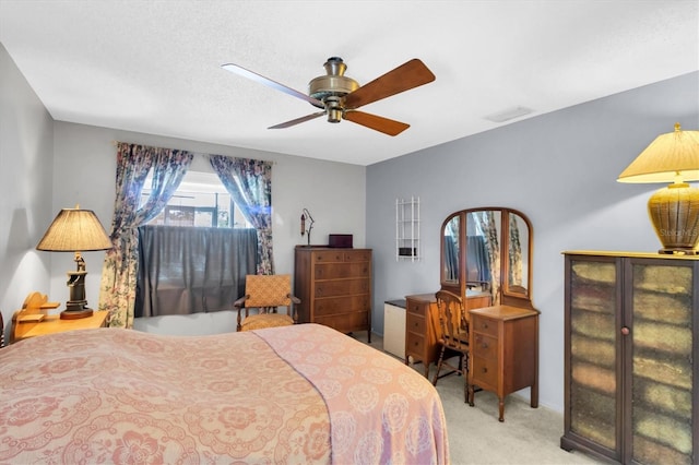 7701 Anaheim Ave, New Port Richey, FL 34655 - bedroom featuring carpet floors and a ceiling fan