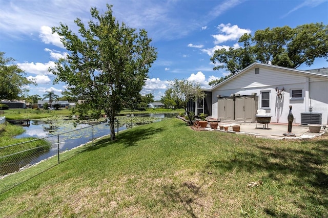 7701 Anaheim Ave, New Port Richey, FL 34655 - view of yard featuring a water view and a patio