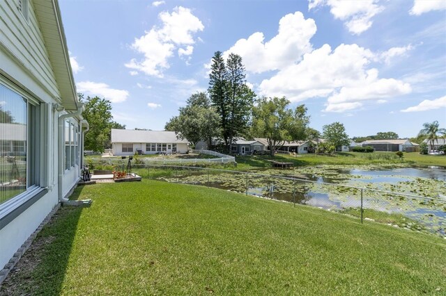 7701 Anaheim Ave, New Port Richey, FL 34655 - view of yard featuring a water view