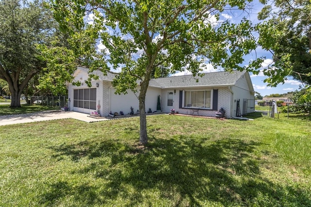 7701 Anaheim Ave, New Port Richey, FL 34655 - ranch-style home featuring brick siding, concrete driveway, and an attached garage