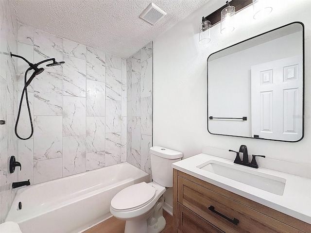 3712 Trophy Blvd Unit 3712, New Port Richey, FL 34655 - bathroom with vanity, shower / tub combination, and a textured ceiling