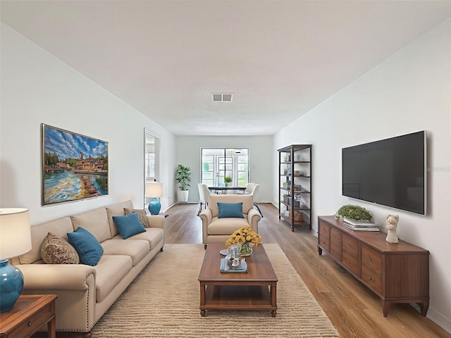 3712 Trophy Blvd Unit 3712, New Port Richey, FL 34655 - living room with light wood finished floors