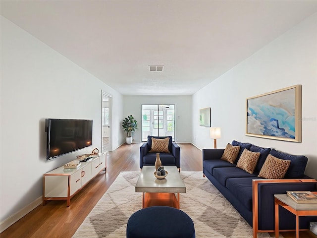 3712 Trophy Blvd Unit 3712, New Port Richey, FL 34655 - living room featuring wood finished floors and baseboards